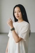 model wearing the Leather and Chain Bracelet with Gunmetal Finish - Convertible Choker
