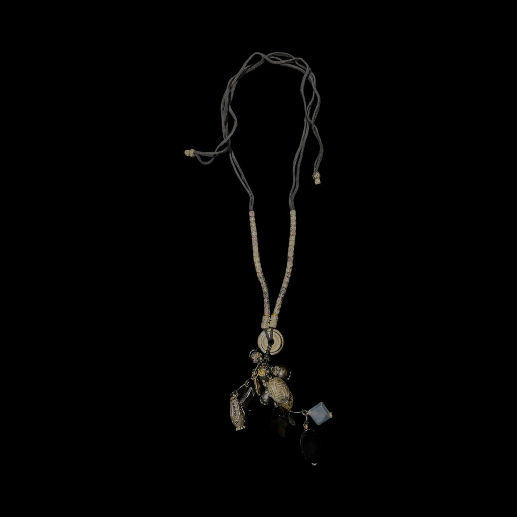 Beaded String Necklace Featuring Collection of Unique Stones