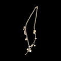 Silver Chain Necklace Featuring Unique Assorted Charms