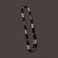 String of black and white beaded necklace