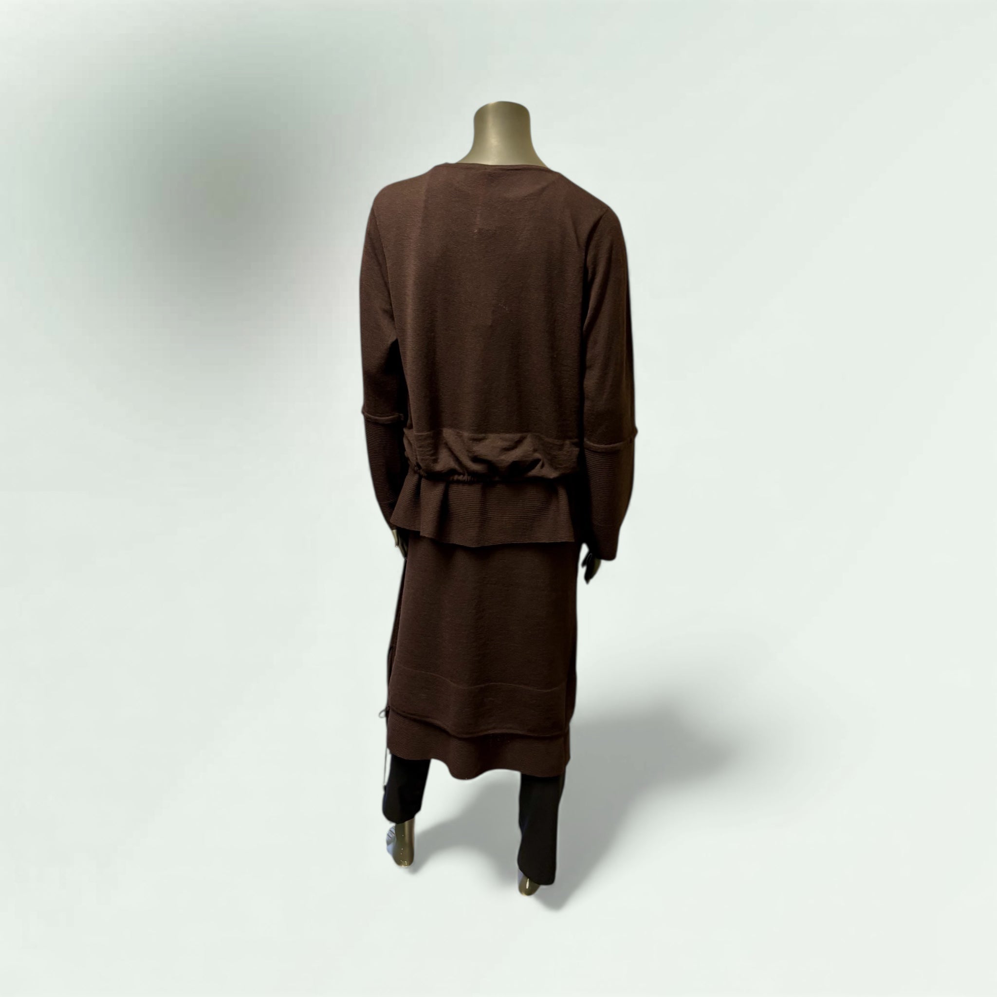 Team the Skirt with Layered Sweater